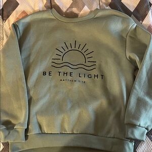 Green Sweatshirt with Sun Graphic